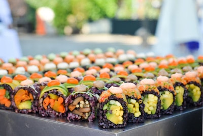 In addition to party platters, vegan eatery Beyond Sushi in New York offers an interactive station that includes a full assortment of signature rolls. The restaurant works with local catering companies to provide the station at events, as well as other menu items. The sustainable, plant-based dishes include the Chic Pea roll with black rice, roasted eggplant, artichoke, and English cucumber topped with saffron chickpea pureé and parsley; and the La Fiesta roll with black rice, avocado, chayote, and pickled jalapeño topped with black bean purée and kaffir lime chips. The eatery’s 3,000-square-foot 37th Street location is also available for private event bookings, and includes bar service, food, and staffing for 75 guests.