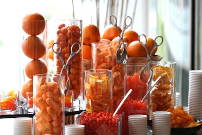 For a bold meeting-break offering, Mandarin Oriental Las Vegas offers the 'Orange-You-Glad' setup, a variety of orange foods in clear glass vessels, including kumquats, tangerines, sour candies, and orange mango cupcakes.