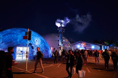 At Google I/O, large tents that held sessions during the day were illuminated for the nighttime events, which included an arcade, musical entertainment, magic shows, and more.