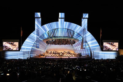 In a surprise performance by famed composer John Williams, the Star Wars theme featured projections designed to transport the audience to the Millennium Falcon.