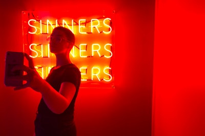 In the hell pit room, neon signage offers the perfect photo opp.