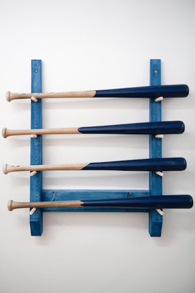 Guests wielded baseball bats painted in Tetley’s blue color.