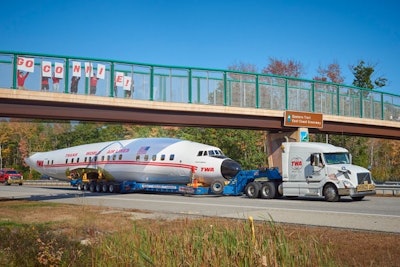 During its journey, the Lockheed Constellation with its bright red 'Trans World Air Lines' logo passed under the Eastern Trail on I-95 in Maine.