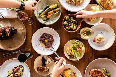 More than 45 Kimpton restaurants across the country will be offering a special Friendsgiving menu, adaptable for office gatherings, with a portion of the proceeds benefiting No Kid Hungry. Menu items and pricing varies, depending on the location. For example, the Turkey Call at Henley in Nashville costs $200 for four to six people and includes turkey, fixings, cornbread, potatoes, rolls, and pie. Items are available for pickup at select restaurants such as the Henley; the Pacific Hideaway in Huntington Beach, California; Panzano in Denver; the Red Owl Tavern in Philadelphia; and Tre Rivali in Milwaukee. Other locations are offering family-style dinners on site.