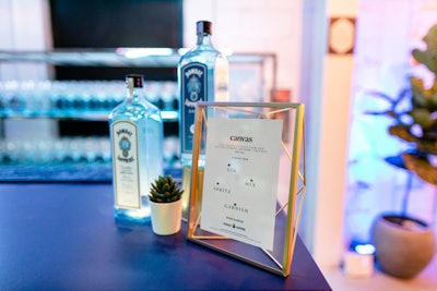 A menu at the bar gives guests an overview of the four steps they can take to make their own gin cocktail. Attendees are given a glass and purchase the base, which is Bombay Sapphire gin on ice.