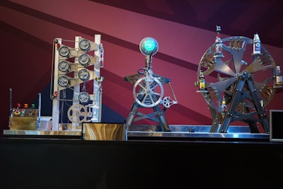 In one area, a robot bartender creates and serves drinks. (A human bartender is on hand to interact with the robot and make sure nothing goes wrong.) The venue also serves what organizers call “farm to circus cuisine”—fresh, organic twists on traditional circus food. Signature drinks are also designed to be an experience, incorporating elements like fire and liquid nitrogen.