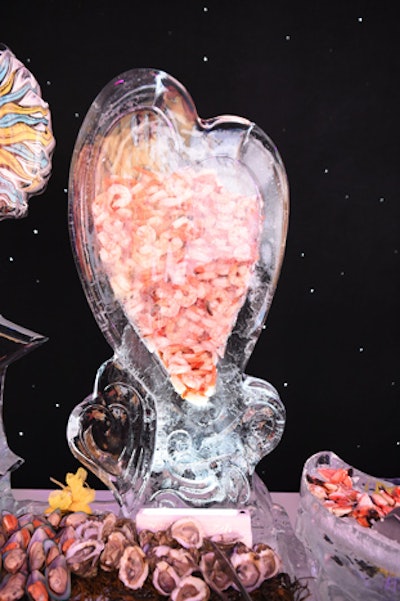 The cocktail reception featured a number of ice sculptures, including a heart filled with shrimp.