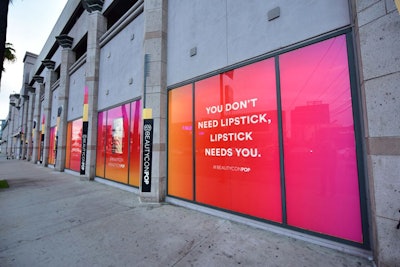 Beautycon Pop takes over a 20,000-square-foot venue near the Beverly Center in Los Angeles until the end of 2018. Colorful signage outside displays Beautycon's motto of 'You don't need lipstick, lipstick needs you.'