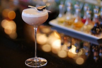 Spago, Beverly Hills, which is managed by Wolfgang Puck Fine Dining Group, serves the Downward Dog. The drink has Elijah Craig bourbon, Michter's US1 rye whiskey, fresh figs, lemon juice, Demerara sugar, and egg white foam.