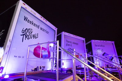 In the pilot episode of Good Trouble, the main characters have their U-Haul towed and all of their possessions stolen. To reflect that, organizers hosted the dinner in three moving trucks. Graphics from BOND adorned the outside.