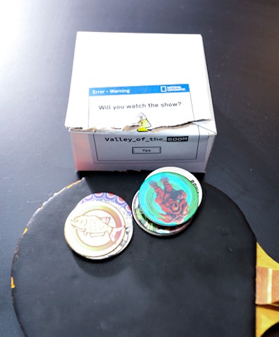 The on-theme boxes from the machines contained items such as Pogs.