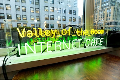 WeWork members were welcomed to the activations with a neon sign in the style of a '90s Internet cafe.