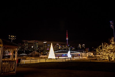 The festival also includes a 10,000-square-foot skating rink, which features a Christmas tree, a narwhal, and a view of the Toronto skyline.