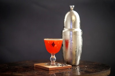 The Alchermes Sour at Bittercube Bar & Bazaar in Milwaukee, Wisconsin, contains lime juice, simple syrup, and Heirloom Alchermes liqueur, and it comes in this brilliant orange coral shade.