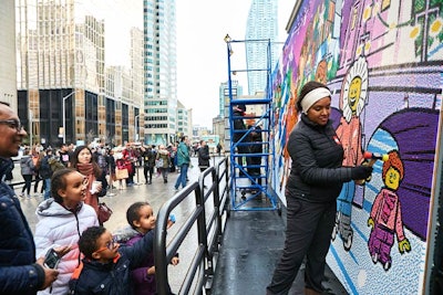 For three weeks leading up to the mural reveal, families were invited to help build one of the 18,432 Lego baseplates needed to create the mural.