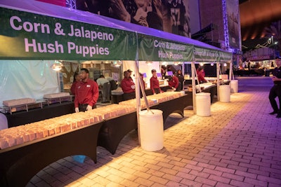 Three days before the event, the teams started staging the food station booths on the site.