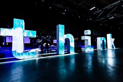 Leading into the opening session, giant “think” letters had video mapping.