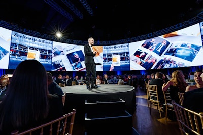 The screen was also used to display informational graphics, as well as the gala's donation totals.