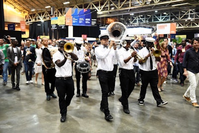 A brass band plays at Collision’s closing ceremony at Ernest N. Morial Convention Center in New Orleans.