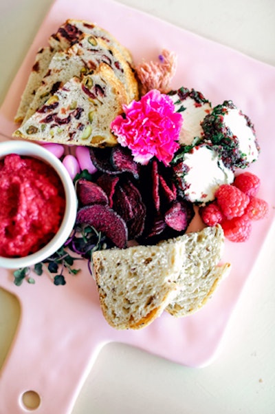 Austin's Catering with a Twist found a crowd-pleasing hit in its new starter boards. Each board is priced from $9 to $12, depending on the chosen items. Rosy-hued starter boards are laden down with nibbles like raspberries, pimento cheese, smoked salmon pate, and beet chips.