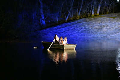 At the screening after-party, mannequins were used to recreate Bird Box's harrowing scene, in which Sandra Bullock's character Malorie rows her two children down a treacherous river while blindfolded. The performance took place in the lake at Central Park next to the Loeb Boathouse.
