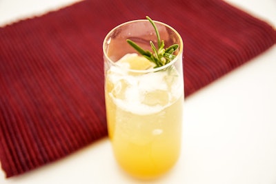 Abigail Kirsch’s peach rosemary mocktail includes peach puree, rosemary infusion, and sparkling soda.