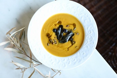 Butternut Squash Soup, sage, pumpkin seeds and huckleberries