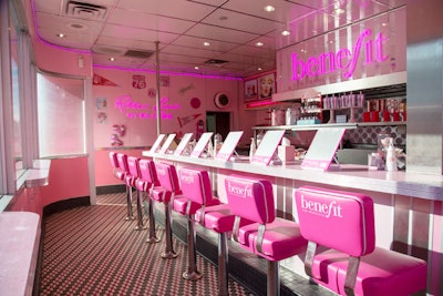 Benefit took over a Johnny Rockets restaurant that had closed in 2015, covering everything in pink and repurposing some of the existing 1950s-inspired elements for its pop-up space.