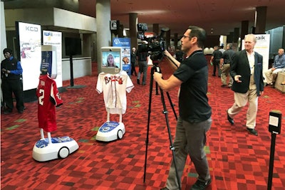 Virtual attendees could visit exhibits via robots controlled from their computers.