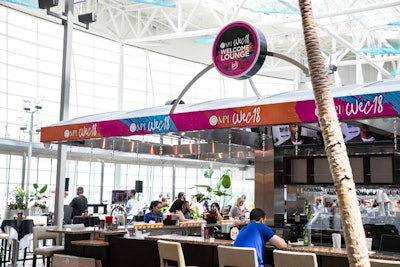 M.P.I. took over an airport bar and turned it into a welcome lounge for attendees.