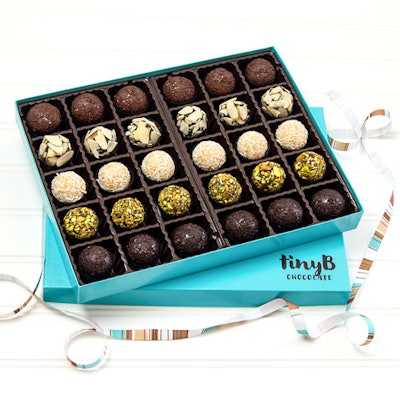 A fresh take on the traditional chocolate truffle, San Francisco-based TinyB offers Brazilian brigadeiros as a unique sweet treat. The smooth and creamy confections are preservative- and gluten-free, and are available in flavors like passion fruit, pineapple, cayenne pepper, and Brazilian coffee. Cleanly packaged in a robin’s egg blue box, the sweets range in price from $12 (for four) to $135 (for a three-box tower of 75). Additionally, the premium chocolates are available with branding options for corporate gift giving. The minimum order is 25 gifts, with a two-week lead time, plus additional set-up rates for a branded box sleeve ($175) and a hang tag ($125).