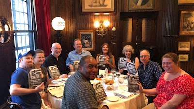 Tour guests connect with The Pride of the Yankees author Richard Sandomir (third from left)