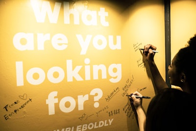 Guests could write what they were looking for—in a relationship or in general—with Black sharpie markers on a yellow wall.