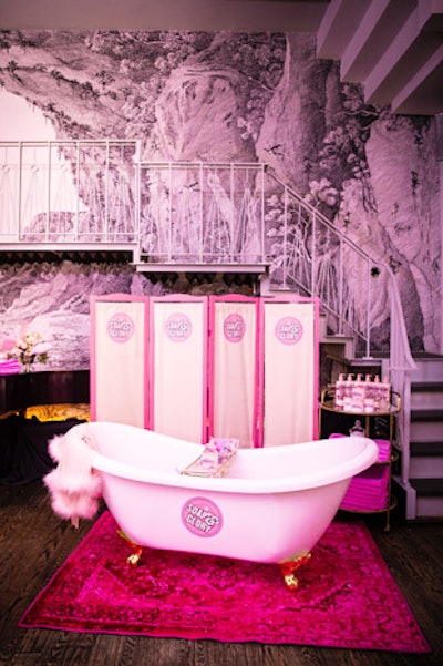 Soap & Glory’s signature pink shade was integrated throughout the vignettes such as a custom oversize vanity, a luxe chaise lounge for photo ops, and a standalone tub.