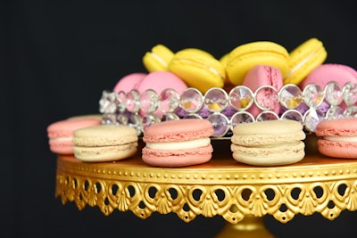 Colorful French macarons will be served.