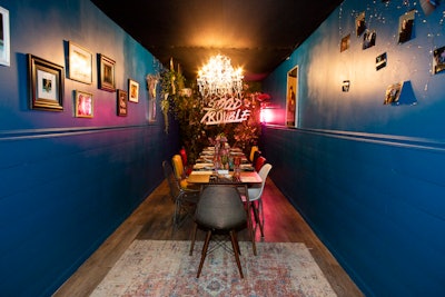 The back of the trucks opened to reveal three distinct spaces inspired by the series, with mismatched chairs, painted walls, framed pictures, and hanging plants creating a cozy but trendy atmosphere. Click here to read more about this event.