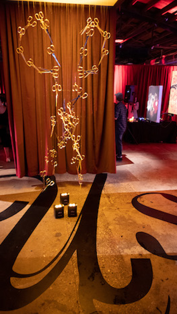 Jordan Peele's new horror film, Us, premiered at Austin's Paramount Theatre during South by Southwest on March 8. The highly anticipated follow-up to Get Out, the movie follows a family that is terrorized by their own creepy doppelgängers—who are all carrying a pair of sharp gold scissors. The after-party featured, what else, an installation constructed from scissors.