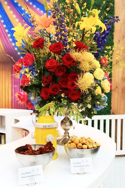 On the bar sat oversize floral arrangements from CJ Matsumoto and Sons along with a mini fire hydrant.