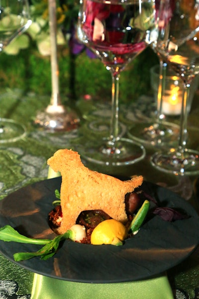 The three-course meal from Good Gracious Events had several playful references to dogs, such as dog-shape croutons for the salad course and bone-shape biscuits served with the entrée. For dessert? The team served chocolate bark.
