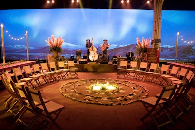 In another area, Soulflower Design Studio created a circular seating area inspired by the mandala symbol of Hinduism and Buddhism. A projected background scene displayed changing images of a tranquil lake and mountain setting. Click here to read more about this event.