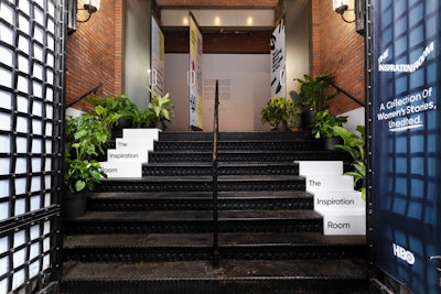 The name of the pop-up was displayed stair wraps that kept with the minimalist aesthetic.