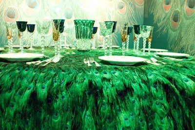 Rockwell Group’s space featured a digital wall covering and a custom hand-made peacock-feather tablecloth to create a modern interpretation of Whistler’s opulent space.