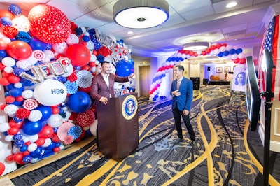 Guests posed in front of a presidential podium with a Veep balloon wall for animated photos they could post on social media. The photos emailed to guests featured Veep and Hamilton Hotel branding.