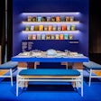 Novita Communications partnered with design studio Maiarelli Studio to create an installation that aimed to connect reading with the feeling of empathy. Instead of plates, open, overturned books, each covering the topic of AIDS, occupied the place settings and stacks of books served as table legs.