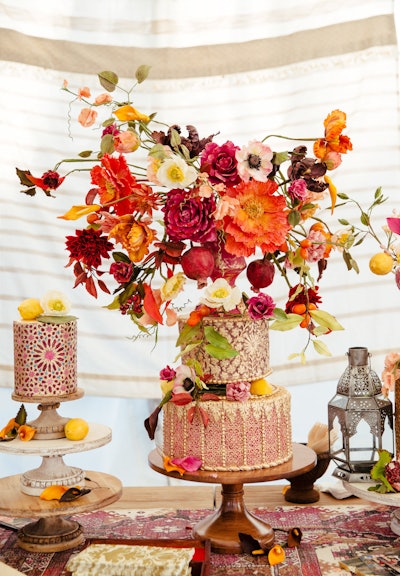 The launch event also featured an eye-catching cake covered in vintage-inspired patterns and large florals.