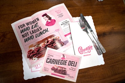 For those dining in, tables displayed printed pink and white placemats, napkins, and menus that promoted the series.