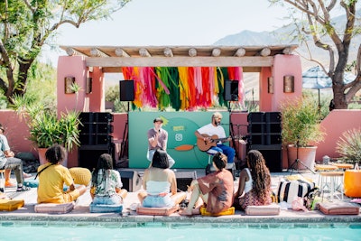 At Instagram's party, colorful streamers behind the DJ booth tied into the event's art-inspired, 1970s-style theme.