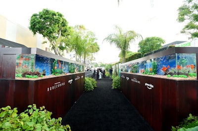 The premiere of Amazon’s Prime Video’s new series Homecoming, starring Julia Roberts, also took place in October. Swisher Productions and 15/40 Productions used live fish tanks in the arrivals area to evoke the main character’s office. The carpet also featured a live palm wall as a reference to the show’s Florida setting.