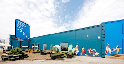 The project’s headquarters and community space, dubbed “307,” features an outdoor area for visitors and an exterior mural designed by Montréal-based illustrator Cécile Gariépy.