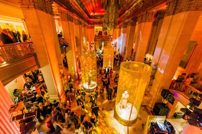 Some 800 guests attended the revamped gala, which was designed by HMR Designs' creative director Bill Heffernan. Frost bathed the Lyric Opera House in fiery hues of orange, red, pink, and gold lighting.